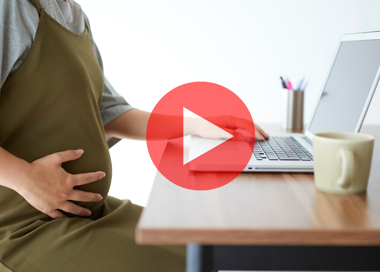 A man with a heart shaped logo.