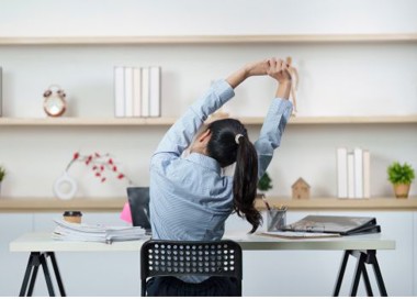 A person sitting at a desk.