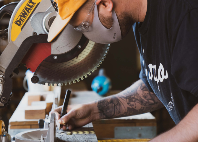 A man working on a machine.