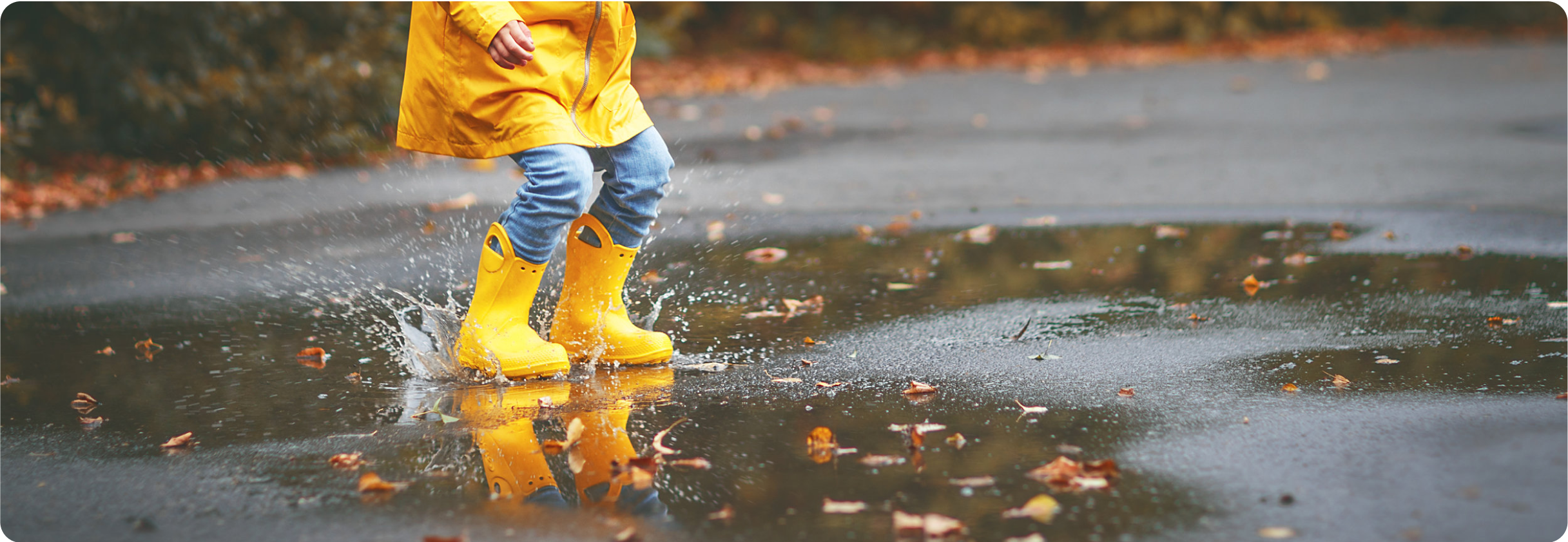 A person walking in a puddle.