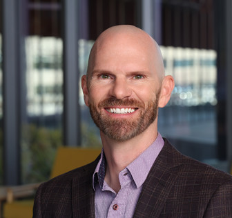 A man smiling for the camera.