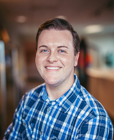 A man smiling for the camera.