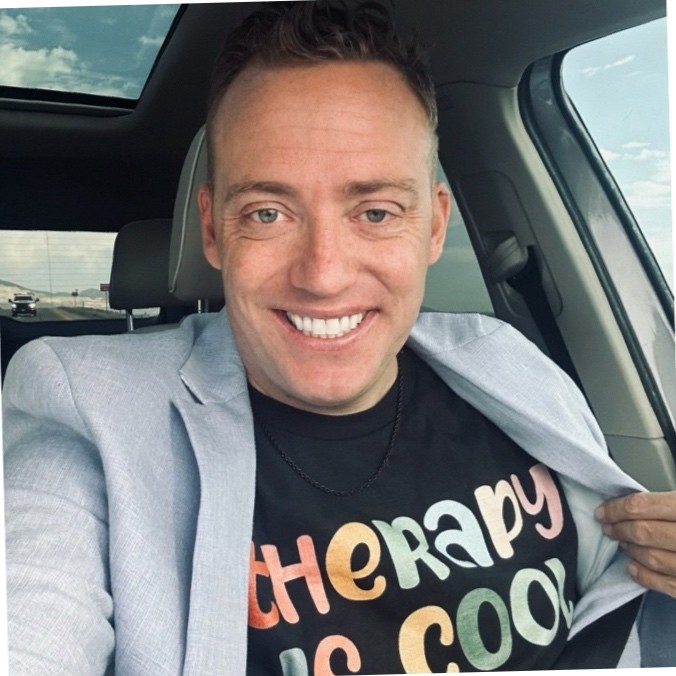 A man smiling for the camera.