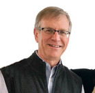 A man wearing glasses.