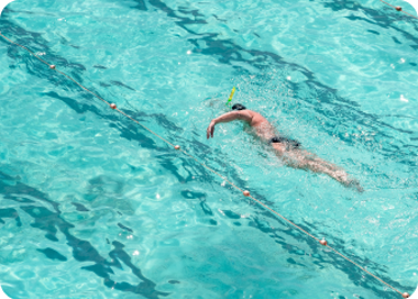 A person swimming in the water.