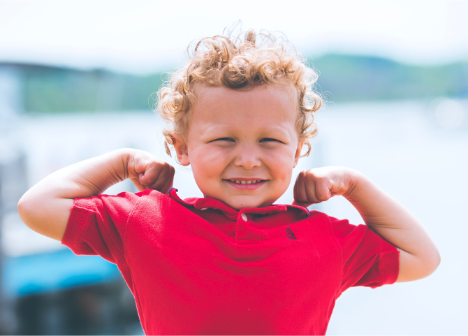 A child with her arms out.