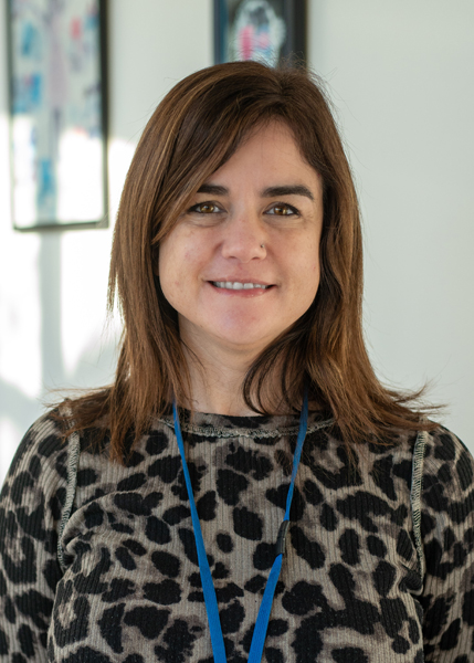 A person smiling for the camera.