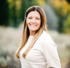 A person smiling for the camera.