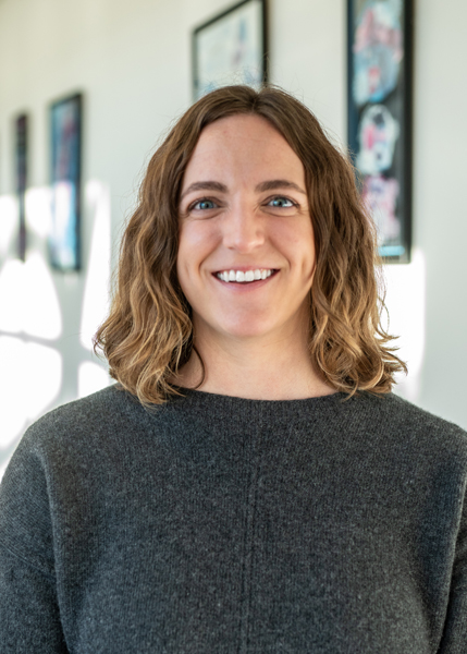 A person smiling for the camera.