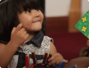A girl holding a flag.