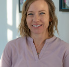 A person smiling for the camera.