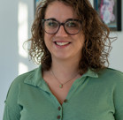 A person wearing glasses.