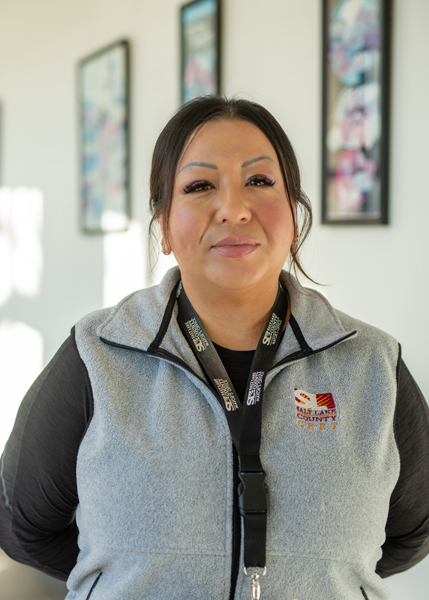 A woman smiling for the camera.