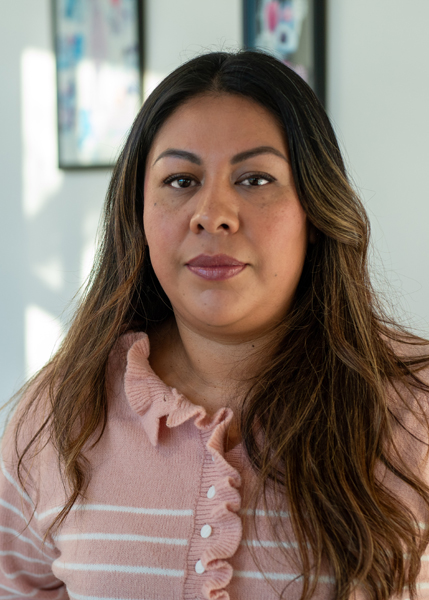 A woman with long hair.
