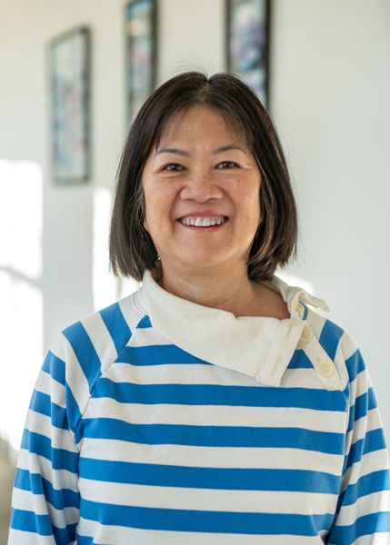 A person smiling for the camera.