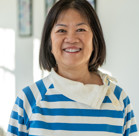 A person smiling for the camera.