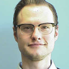 A man wearing glasses.