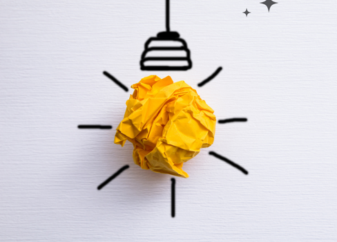 A yellow flower with a black hook.