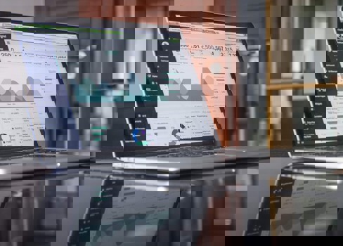 A laptop on a table.