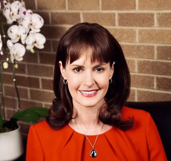A person smiling for the camera.