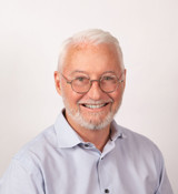 A man wearing glasses.