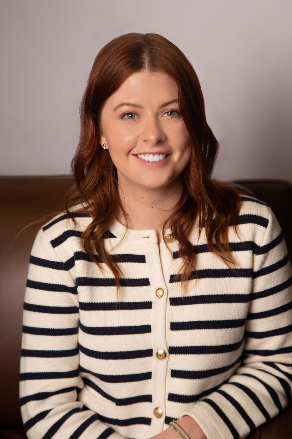 A person smiling for the camera.