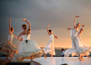 A group of women dancing.