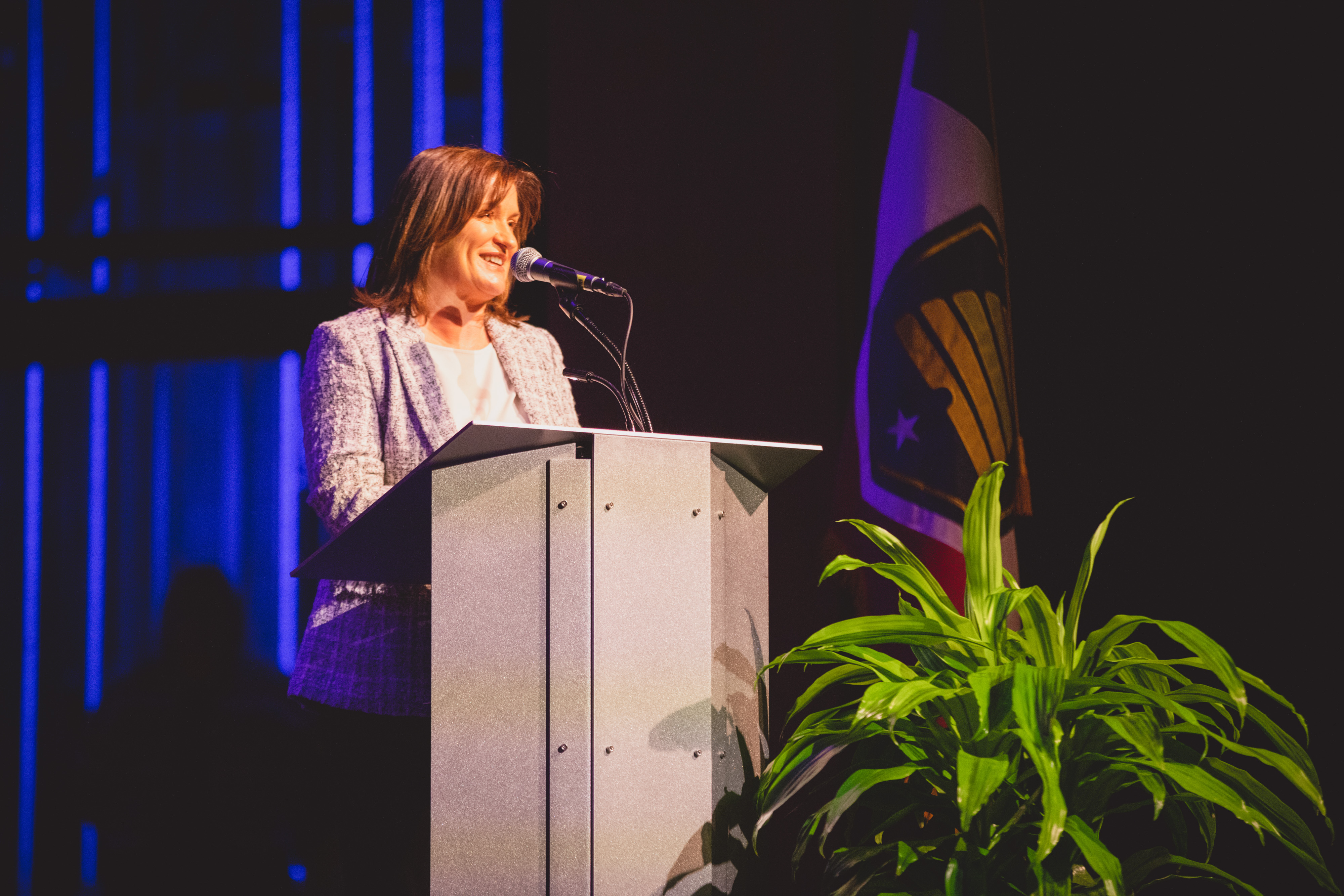 A person standing at a podium.