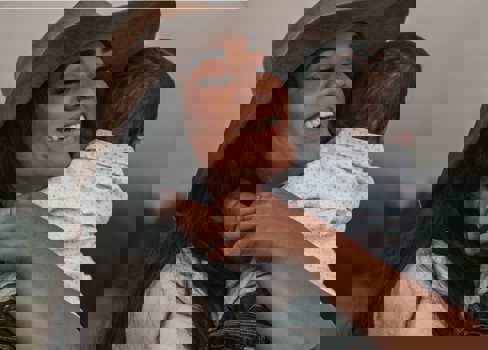 A person holding a baby.