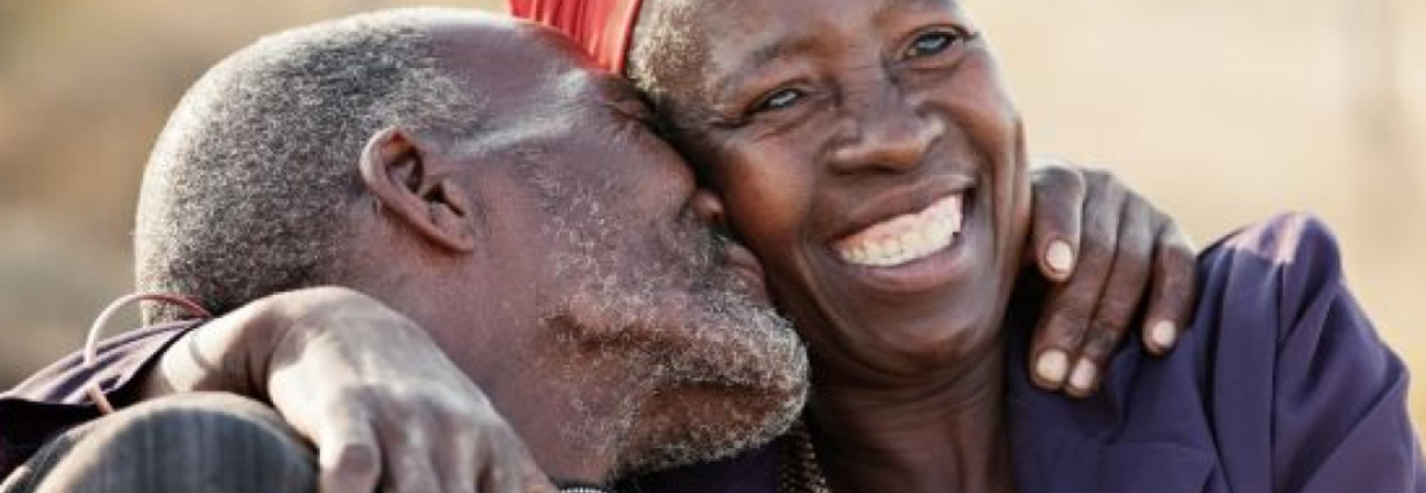 A man holding a baby.