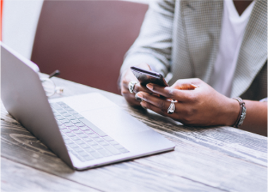 A person using a cell phone.