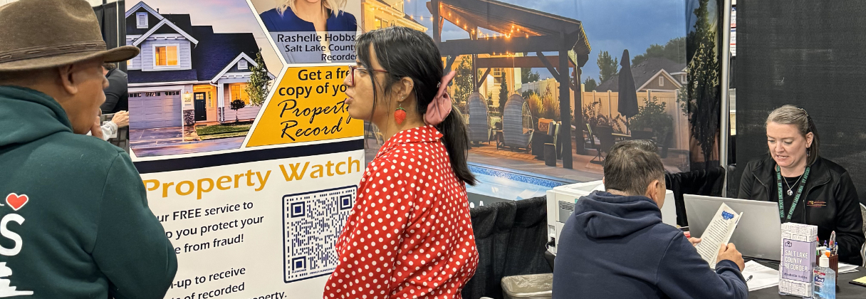 A group of people sitting outside.