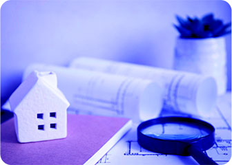 A white and blue cube on a table.