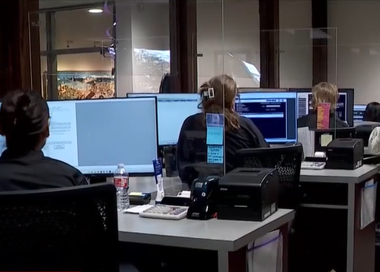 A group of people in an office.