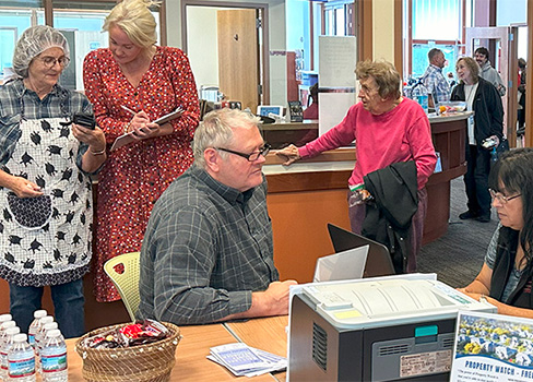 A group of people in a room.
