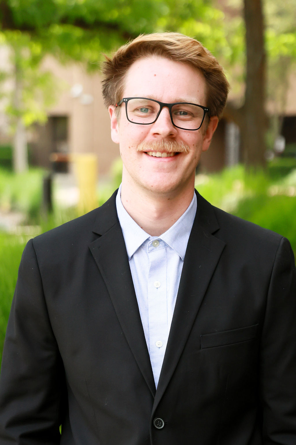 A man wearing glasses.