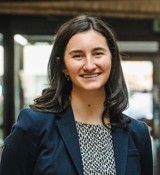 A person smiling for the camera.