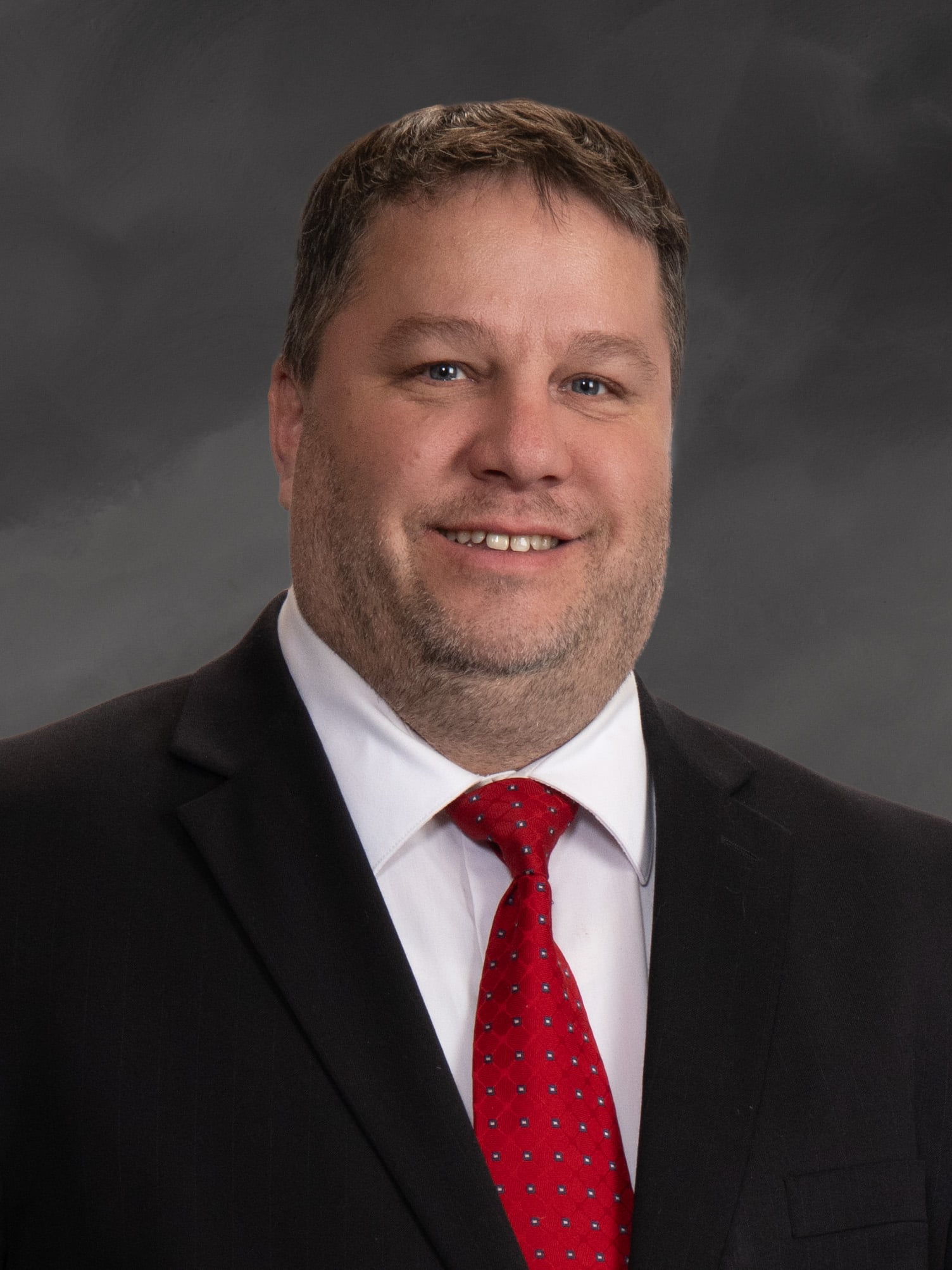 A man in a suit and tie.