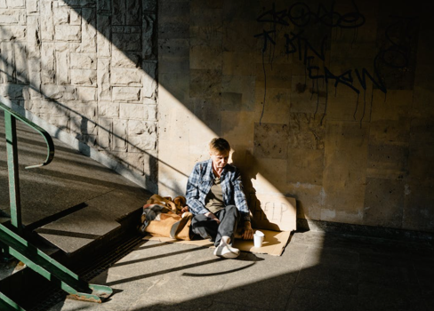 A man sitting on the stairs.