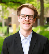 A man wearing glasses.