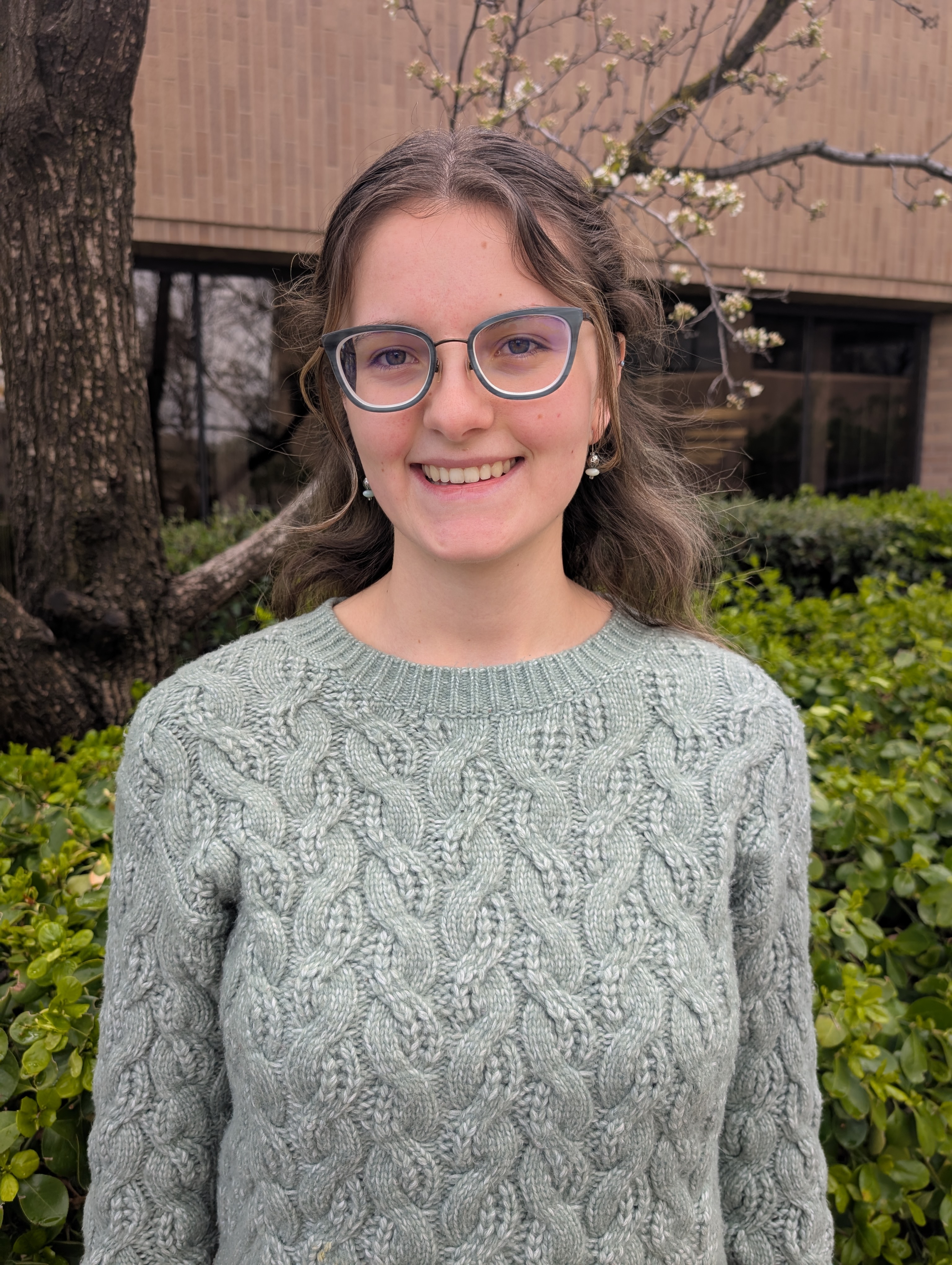 A person wearing glasses.