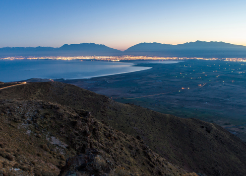 A body of water with land around it.