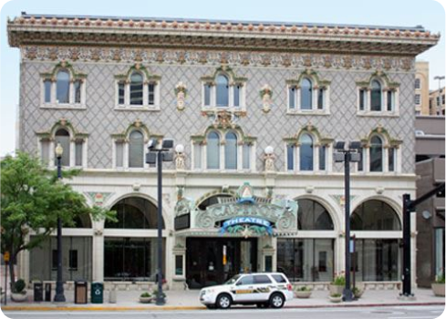 A car parked in front of a building.