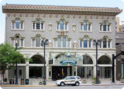 A car parked in front of a building.