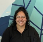 A person smiling for the camera.