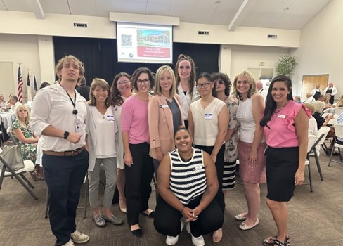 A group of women posing for a photo.