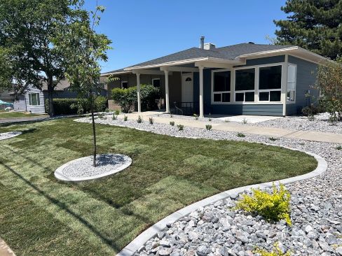 A house with a large front yard.