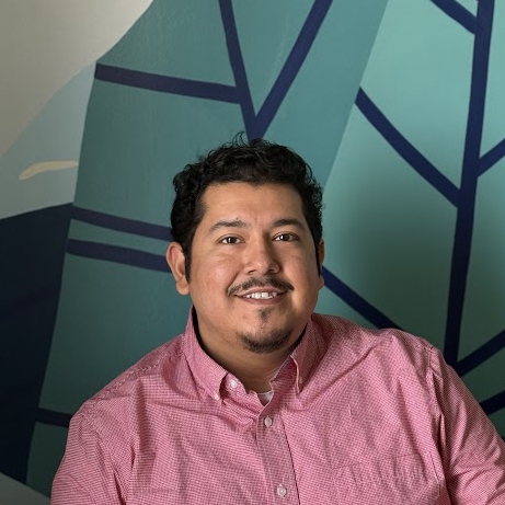 A man smiling for the camera.