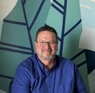 A man wearing glasses.