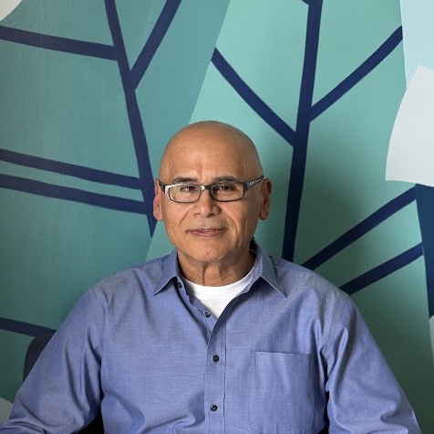 A man wearing glasses.